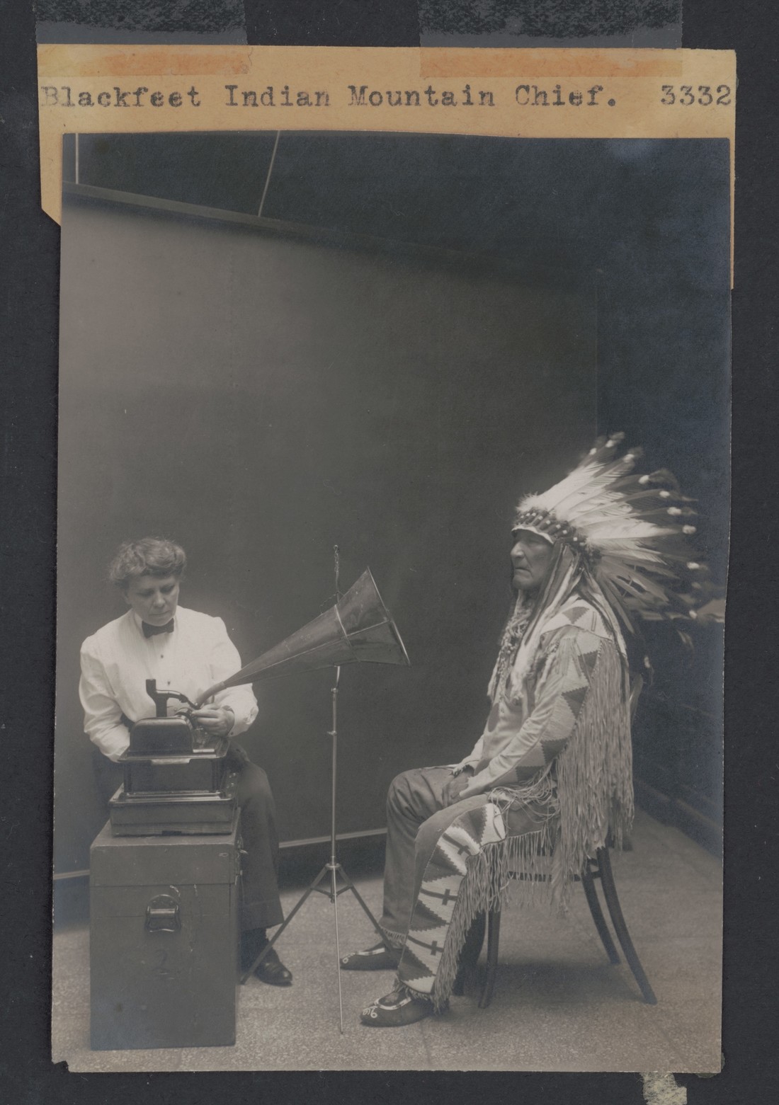 Ethnologist Frances Densmore and Mountain Chief. Photo by Harris & Ewing, Inc. 1916 (via the Library of Congress)